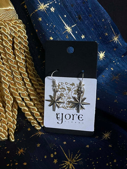 A pair of Handmade Medieval Inspired North Star Earrings in Aged Silver, dangly charms.