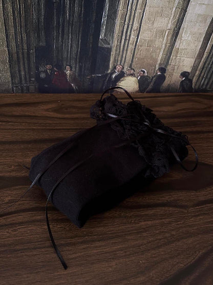 Historically Inspired Cotton Knee-High Socks with Lace Trim in  gothic Black in front of a historical painting backdrop.
