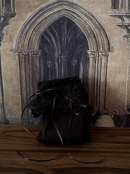 Historically Inspired Cotton Knee-High Socks with Lace Trim in  gothic Black in front of a historical painting backdrop.