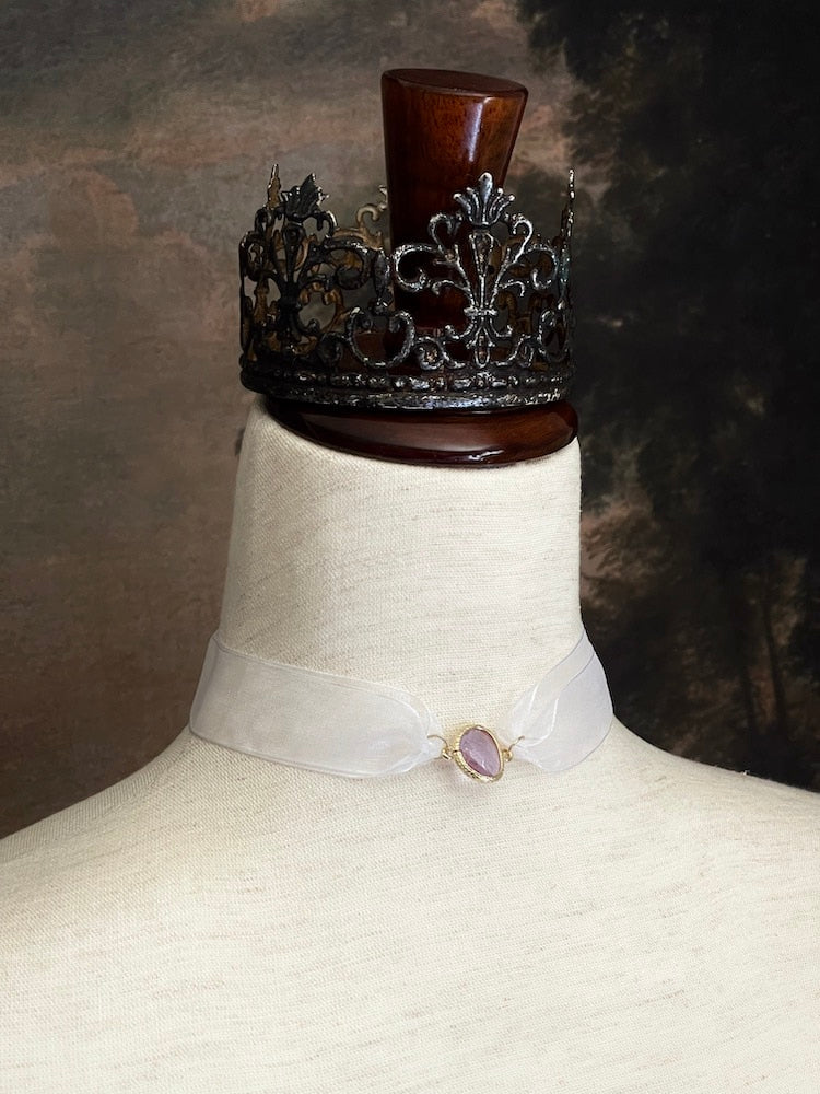 A Historically inspired fantasy ballerina nutcracker balletcore ribbon choker necklace with pastel purple gem.