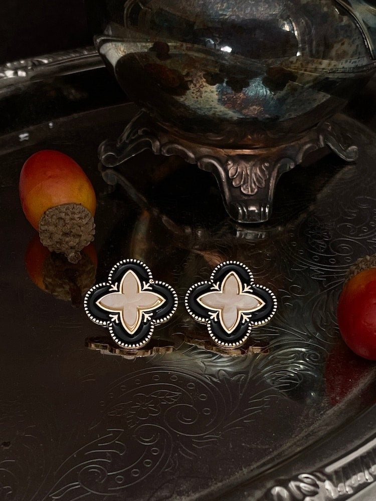 Historically Inspired Renaissance Quatrefoil Stud Earrings in Black x Ivory on an antique dish autumn display