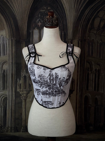 A Pair of Baroque & Rococo Era Gothic Black & White Toile Corset Stays with Satin Bowtied Ribbons.