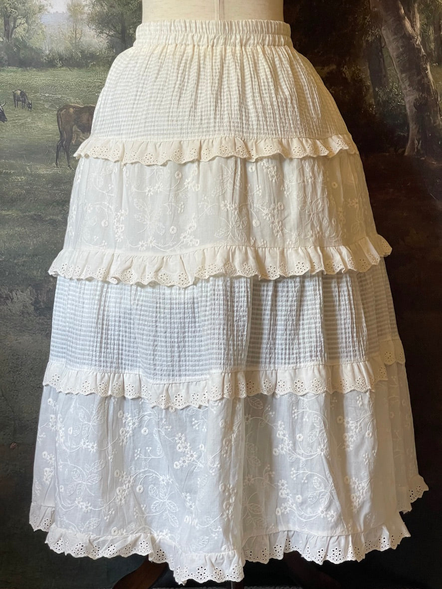 A Historically Inspired floral embroidered lace tiered maxi skirt, perfect for cottagecore victorian, edwardian, renaissance, and medieval looks.