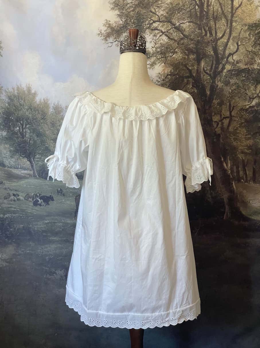 Historically Inspired vintage style Brushed Cotton Chemise Mini Babydoll Dress in White featuring floral lace trim, button-front, cinching ribbons.