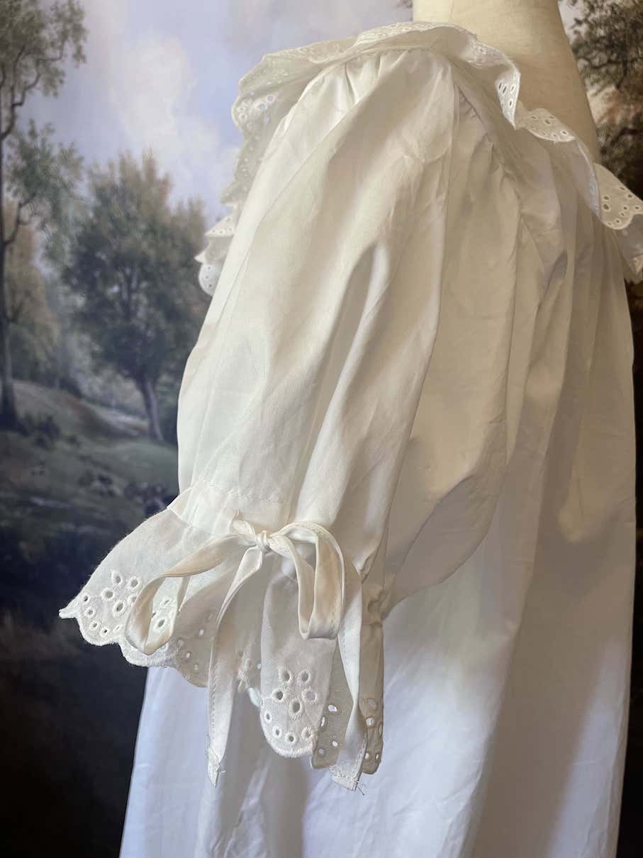 Historically Inspired vintage style Brushed Cotton Chemise Mini Babydoll Dress in White featuring floral lace trim, button-front, cinching ribbons.
