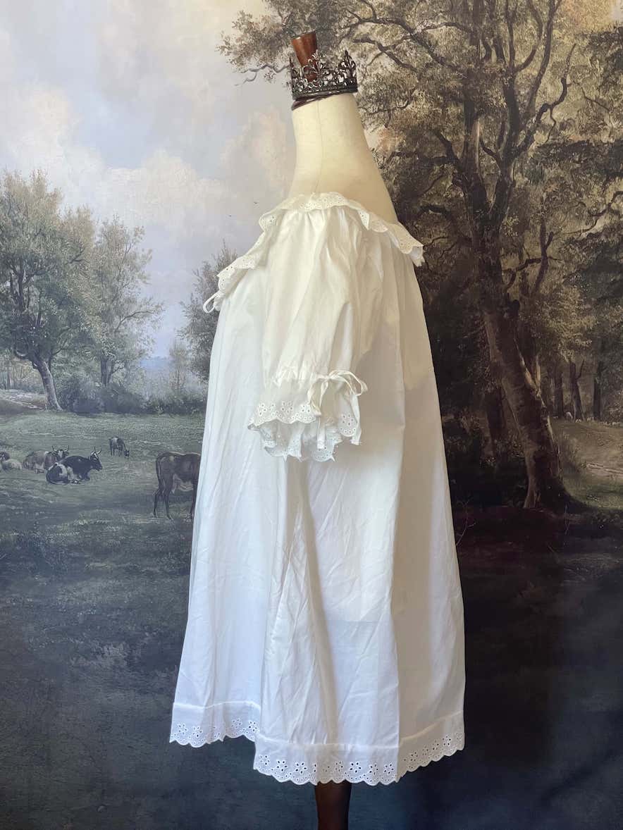 Historically Inspired vintage style Brushed Cotton Chemise Mini Babydoll Dress in White featuring floral lace trim, button-front, cinching ribbons.