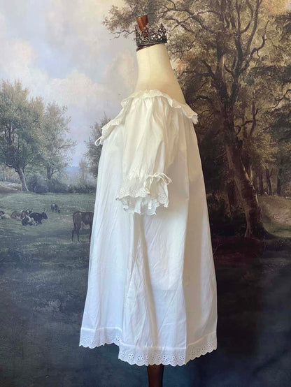Historically Inspired vintage style Brushed Cotton Chemise Mini Babydoll Dress in White featuring floral lace trim, button-front, cinching ribbons.