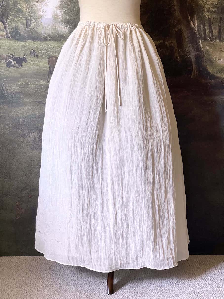 Historically inspired cream colored crepe maxi skirt with drawstring waist, perfect for victorian, edwardian, regency, rococo, baroque, renaissance, or medieval fashion.