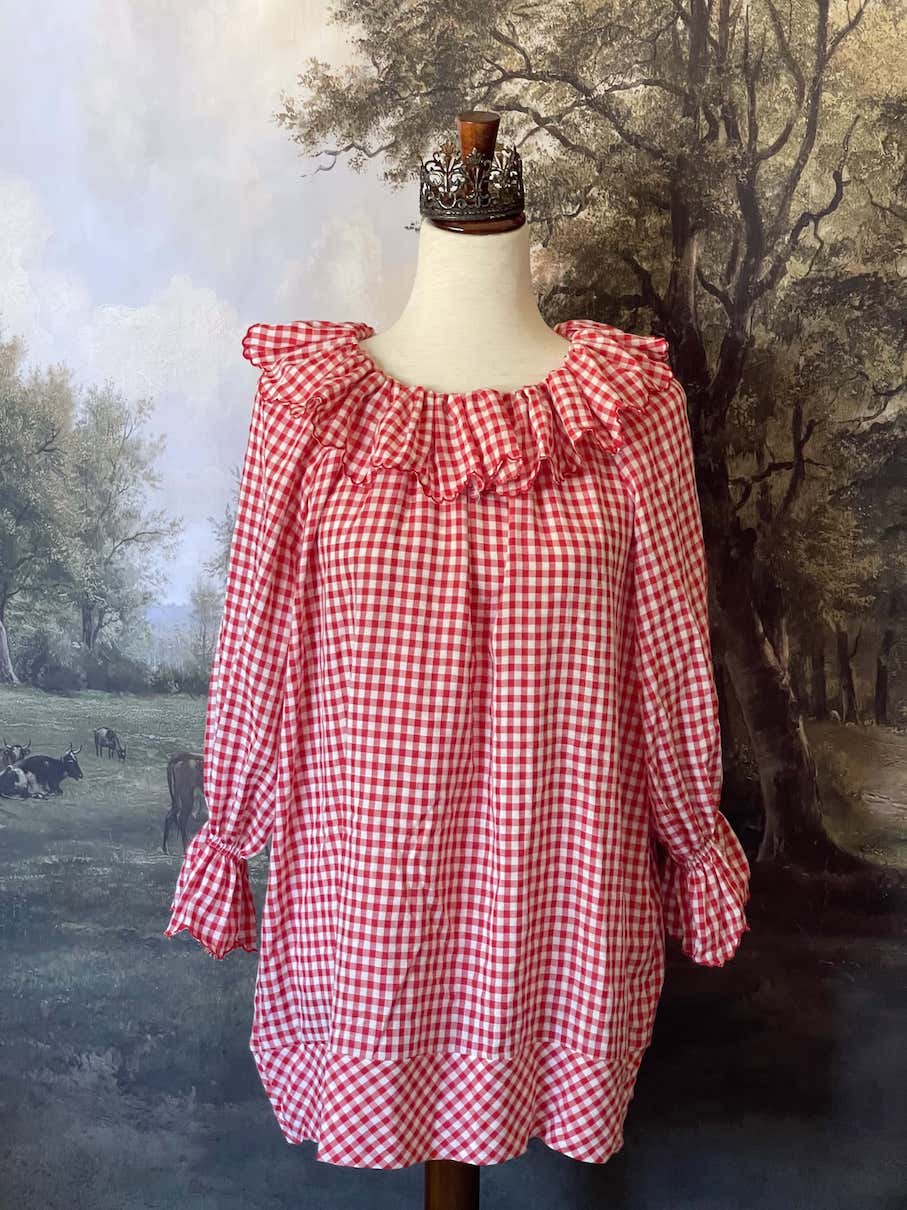 A Historically Inspired vintage style victorian countryside cottage gingham tunic dress in red and white, with ruffle collar and scalloped hem bishop sleeves.