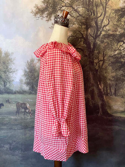 A Historically Inspired vintage style victorian countryside cottage gingham tunic dress in red and white, with ruffle collar and scalloped hem bishop sleeves.