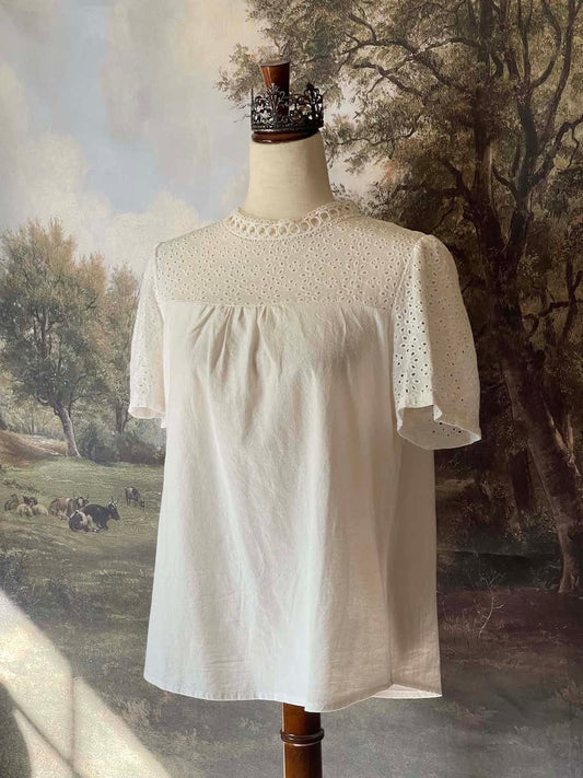 A Historically inspired edwardian style short sleeve blouse with eyelet lace yoke and scalloped lace collar.