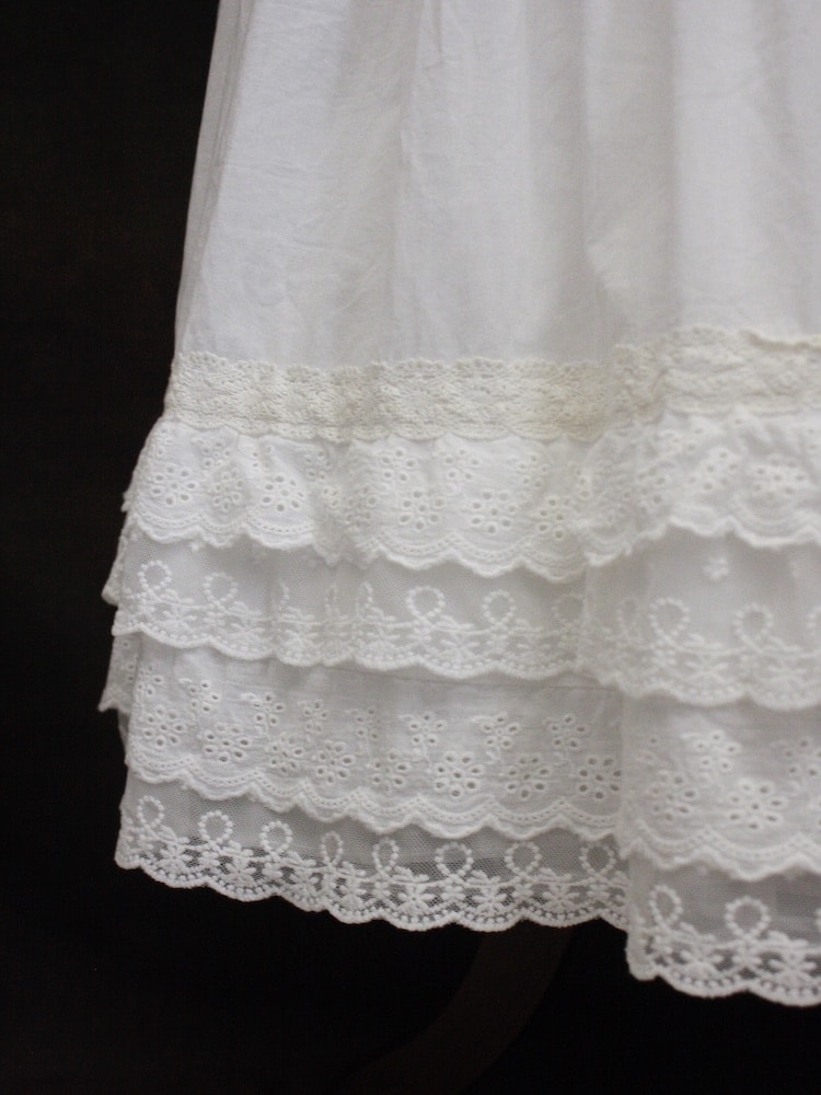 lace detail on a historically inspired bohemian maxi skirt with lace trim.