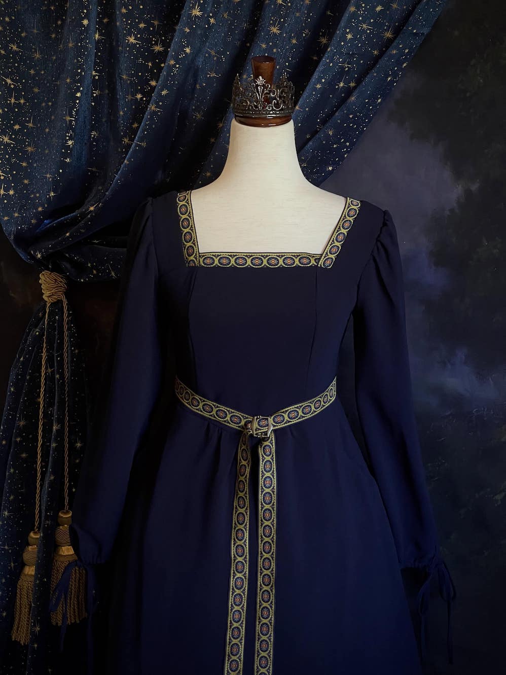 A Historically Inspired Tudor Style Medieval Renaissance Bishop Sleeve Square Neck Midi Dress with Embroidered trim and Detachable Belt, in Navy Saxon Blue x Gold.