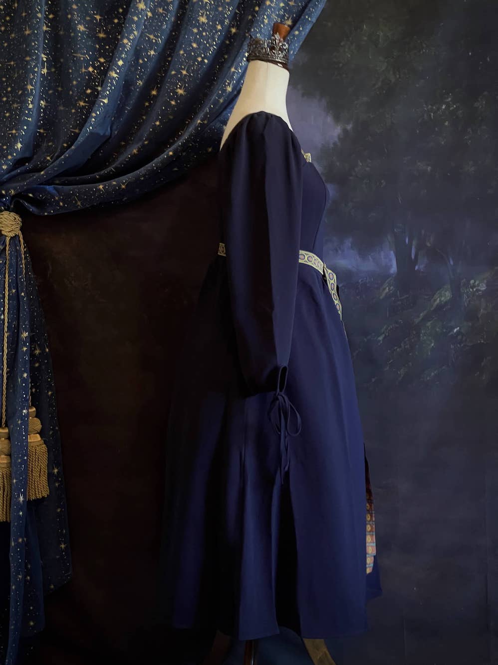 A Historically Inspired Tudor Style Medieval Renaissance Bishop Sleeve Square Neck Midi Dress with Embroidered trim and Detachable Belt, in Navy Saxon Blue x Gold.