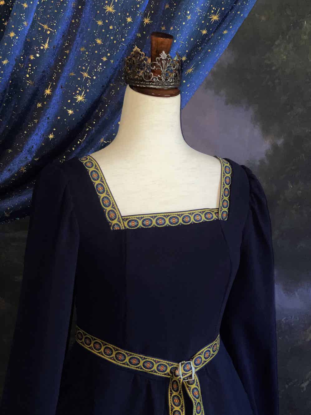 A Historically Inspired Tudor Style Medieval Renaissance Bishop Sleeve Square Neck Midi Dress with Embroidered trim and Detachable Belt, in Navy Saxon Blue x Gold.