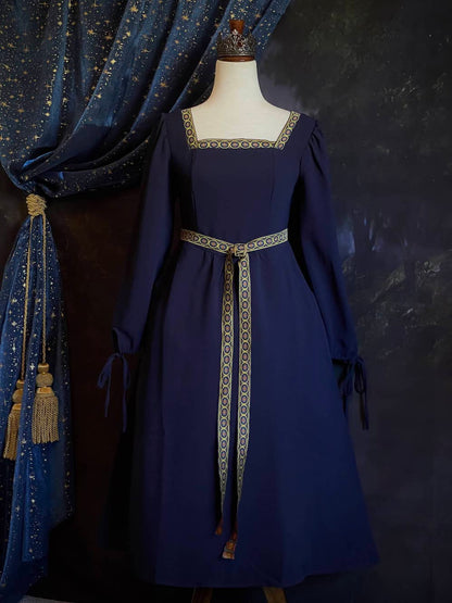 A Historically Inspired Tudor Style Medieval Renaissance Bishop Sleeve Square Neck Midi Dress with Embroidered trim and Detachable Belt, in Navy Saxon Blue x Gold.