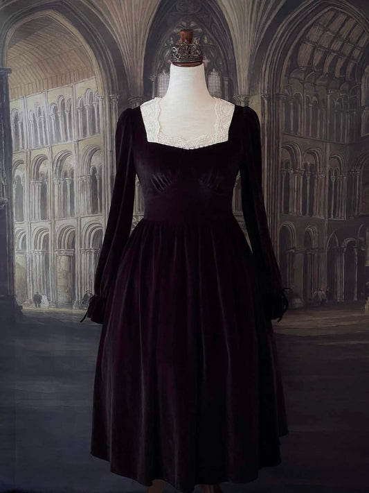 A Historically Inspired Tudor Fashion inspired Bustier Midi-maxi Dress with Lace Trim and bishop sleeves in Gothic Black Velvet