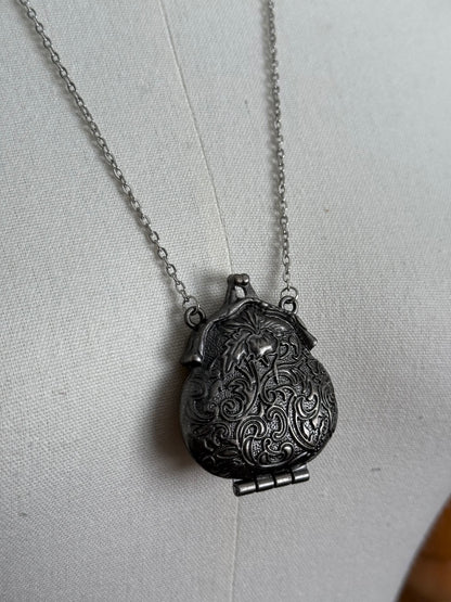 Victorian inspired historical coin purse trinket box pendant necklace with repousse designs in a darkened tarnished finish