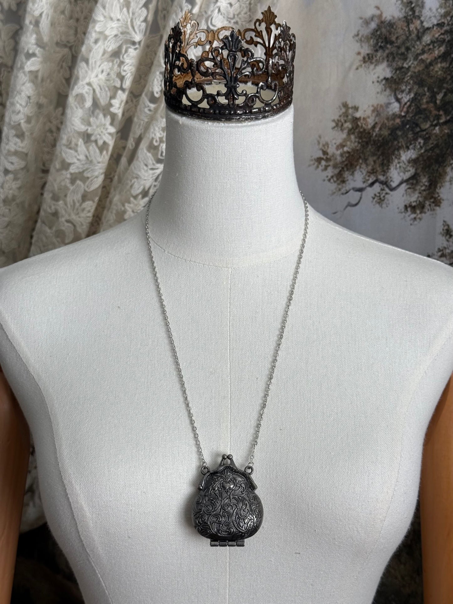 Victorian inspired historical coin purse trinket box pendant necklace with repousse designs in a darkened tarnished finish