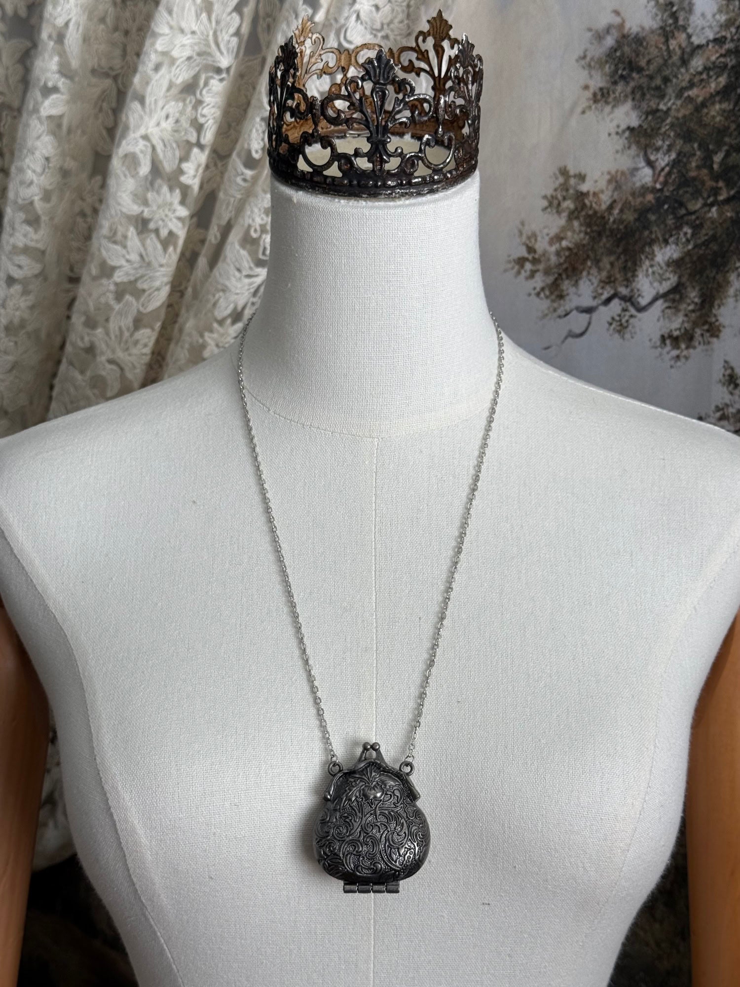 Victorian inspired historical coin purse trinket box pendant necklace with repousse designs in a darkened tarnished finish