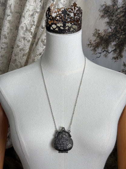 Victorian inspired historical coin purse trinket box pendant necklace with repousse designs in a darkened tarnished finish
