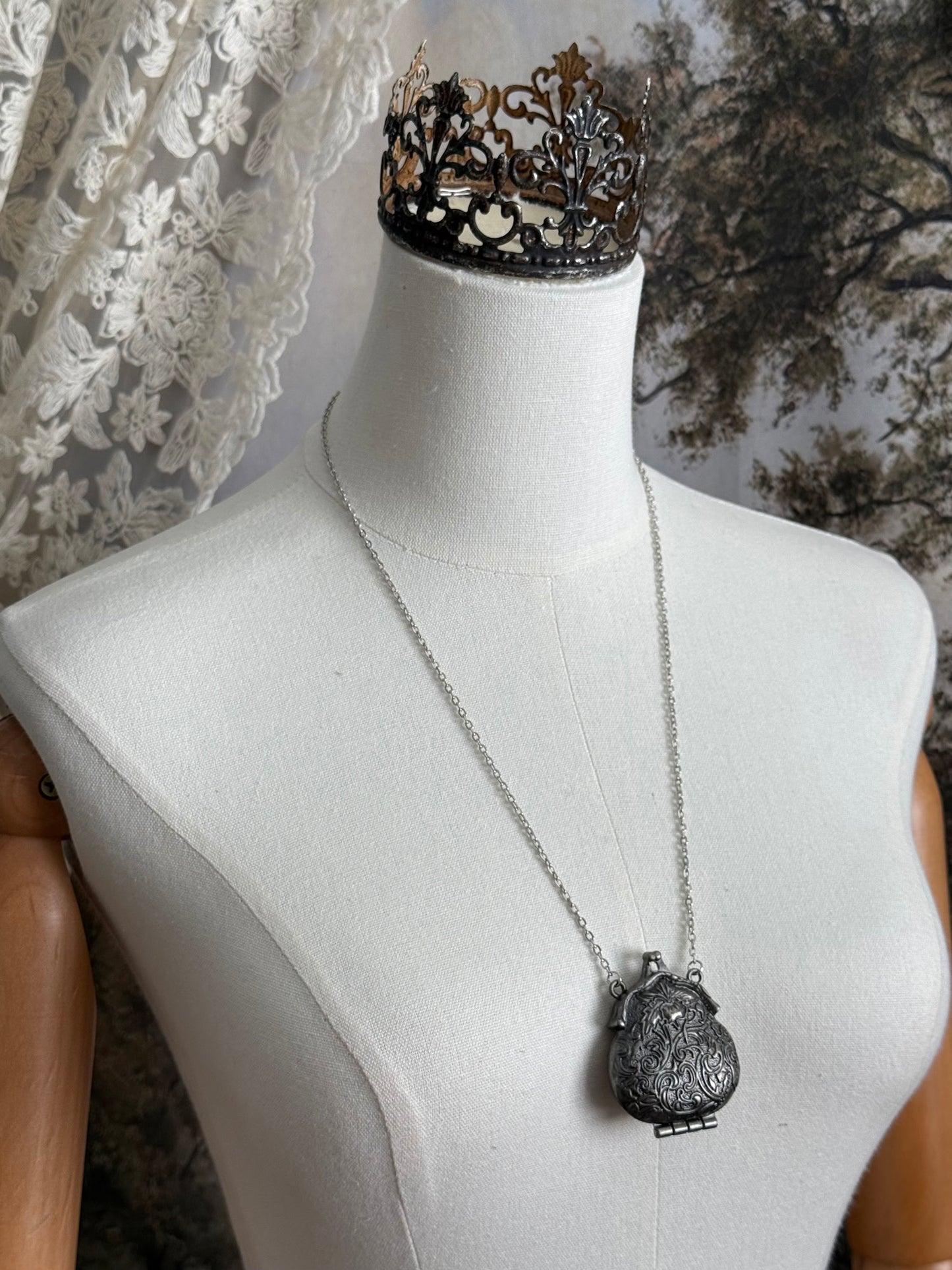 Victorian inspired historical coin purse trinket box pendant necklace with repousse designs in a darkened tarnished finish