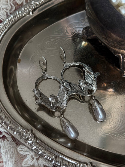 Historically inspired Turn-of-the-Century Art Nouveau Silverwork style  Earrings with Pearl Dangle displayed on an antique silver dish