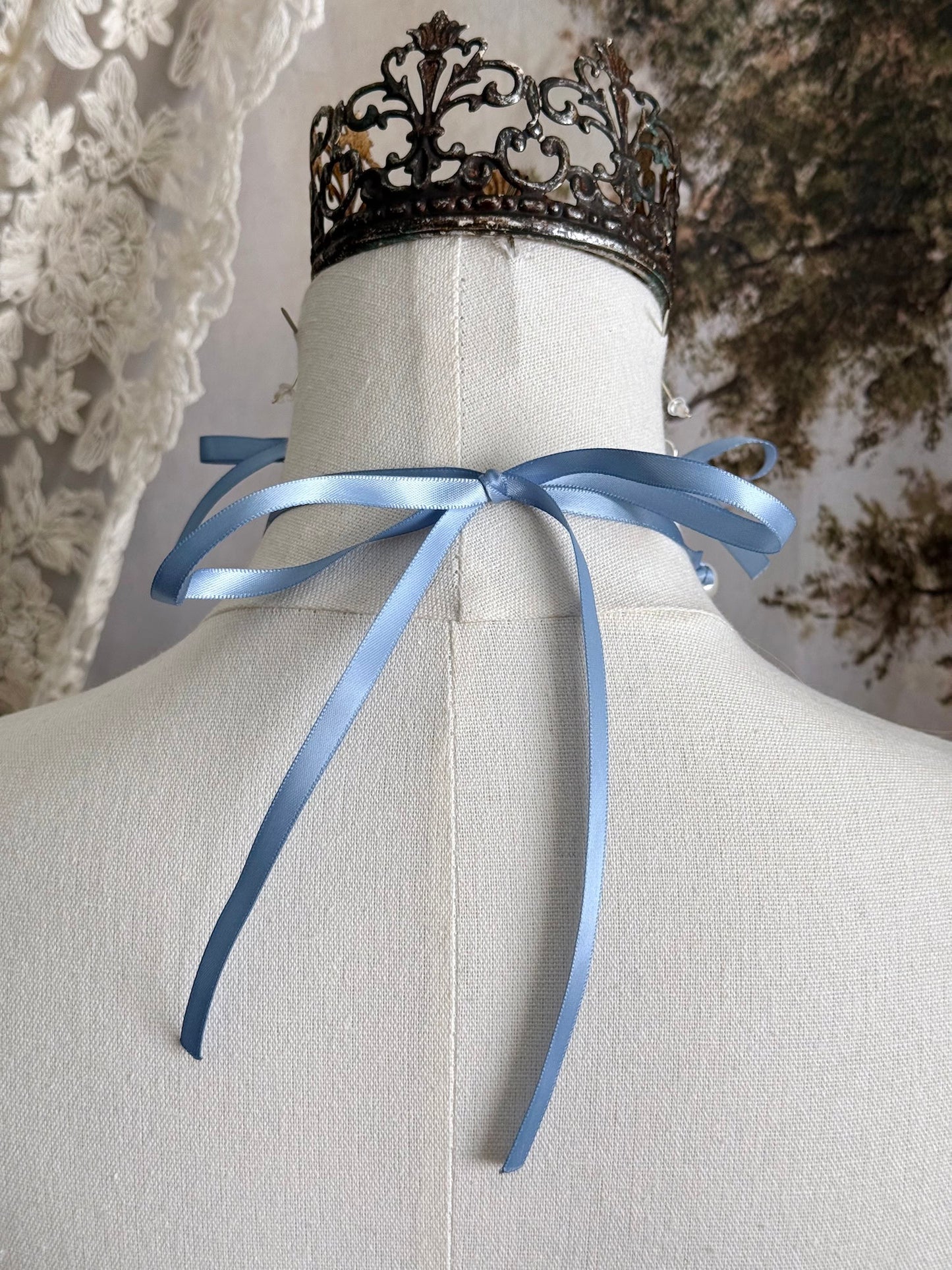 The bowtie closure on the back of the necklace
