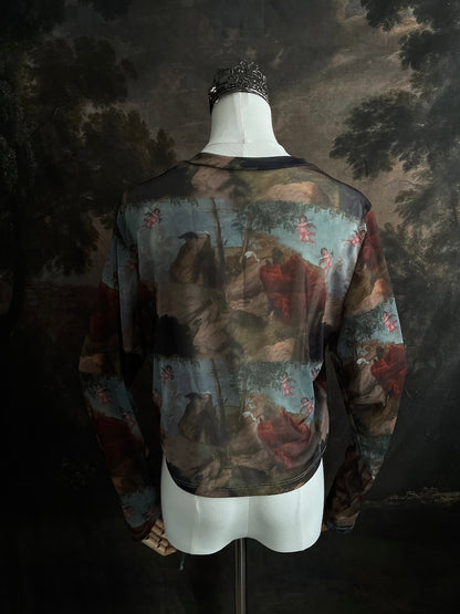 A Historical Renaissance Painting Printed Sheer Mesh Long-Sleeve Ruched Blouse on a mannequin in front of an art history backdrop
