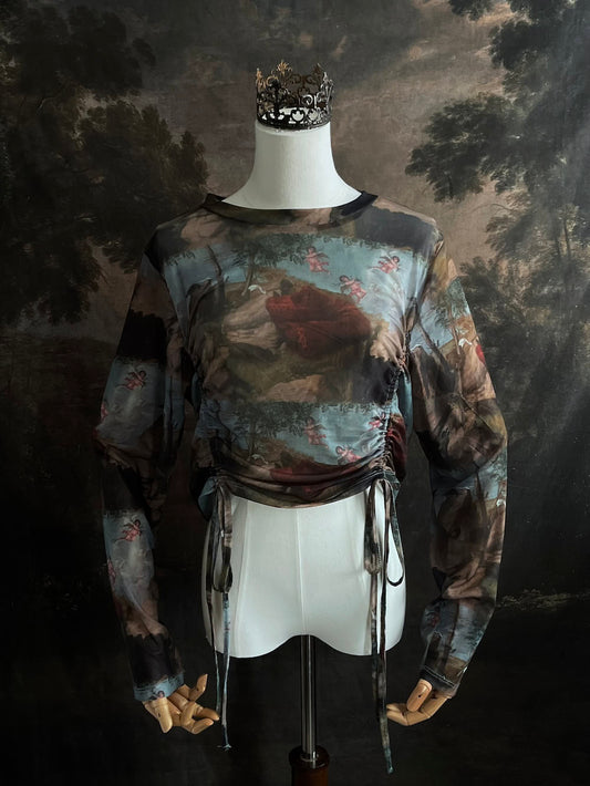 A Historical Renaissance Painting Printed Sheer Mesh Long-Sleeve Ruched Blouse on a mannequin in front of an art history backdrop