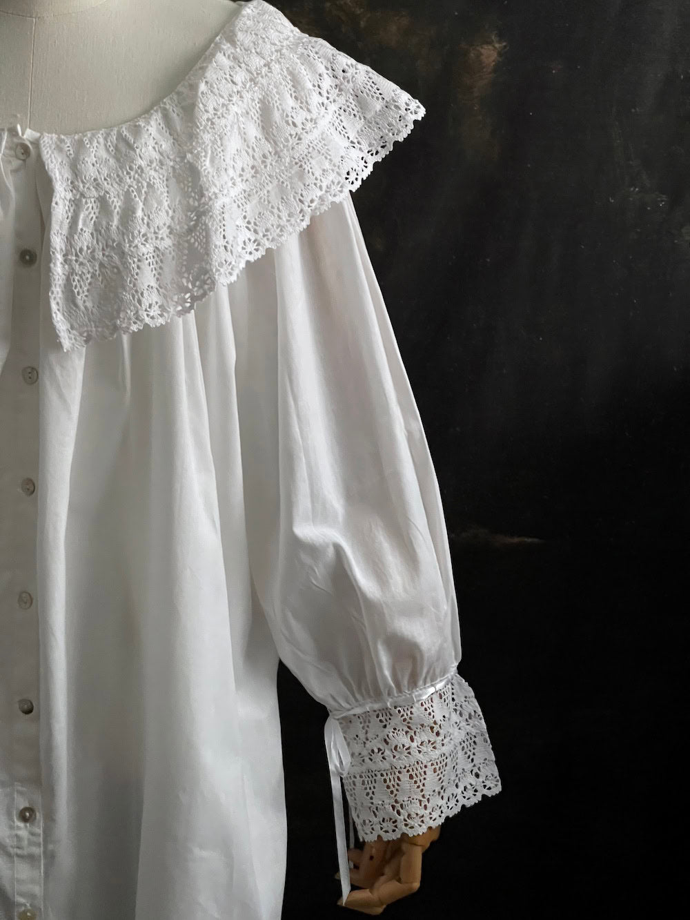 A Baroque to Victorian era historically inspired white cotton chemise dress with large crochet lace collar and bishop sleeves