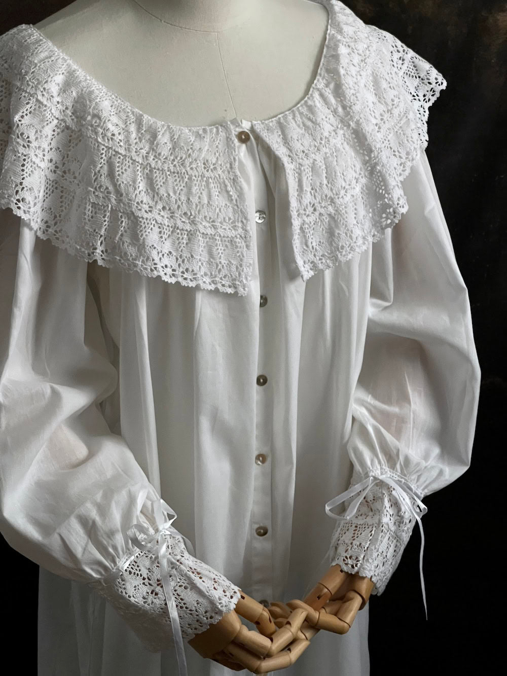 Details of a Baroque to Victorian era historically inspired white cotton chemise dress with large crochet lace collar and bishop sleeves