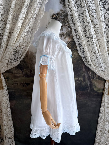 Historically Inspired vintage style Brushed Cotton Chemise Mini babydoll Dress with button up front, White x Light Blue scalloped floral embroidered Lace Trim, ruffle hem, and ruffle collar.