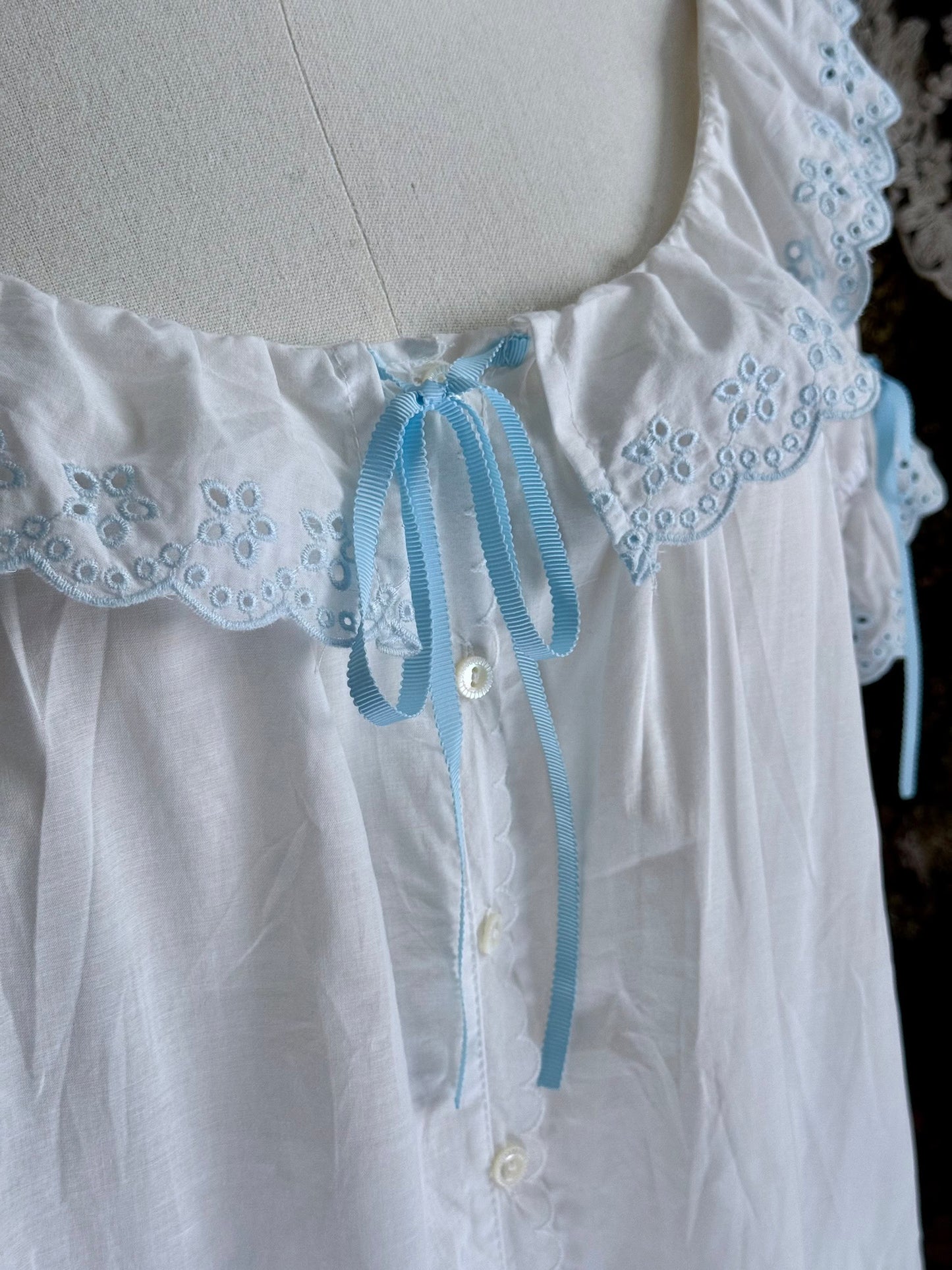 Historically Inspired vintage style Brushed Cotton Chemise Mini babydoll Dress with button up front, White x Light Blue scalloped floral embroidered Lace Trim, ruffle hem, and ruffle collar.