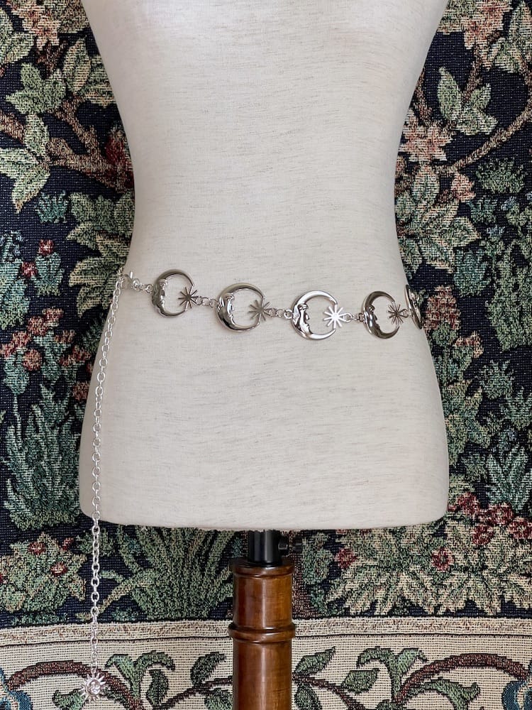 Historical Fantasy Inspired Celestial crescent Moon and Sun Belt in silver, pictured on a mannequin.