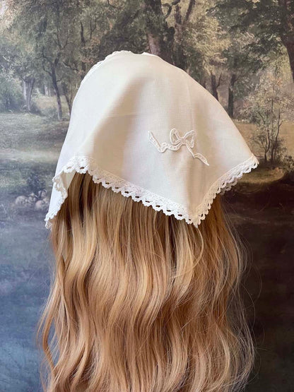 Historically inspired cottagecore coquette victorian babushka style triangle headscarf hair accessory with lace trim and bow accessories. 