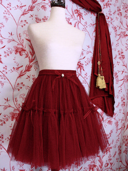 A Historically Inspired Victorian Style Frilly Tiered Ballet tutu Skirt with Bow Appliques and Rosette Embellishentin Burgundy.