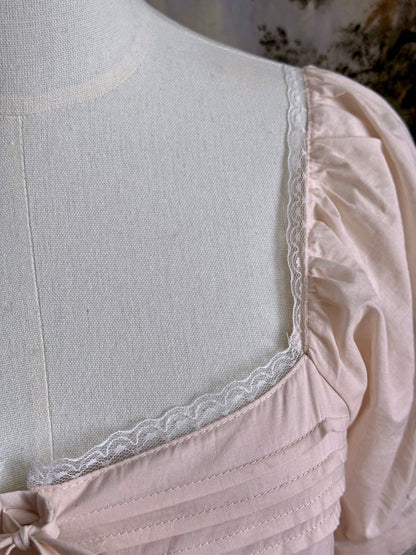 Close-up of the vintage-style dress's lace trim.
