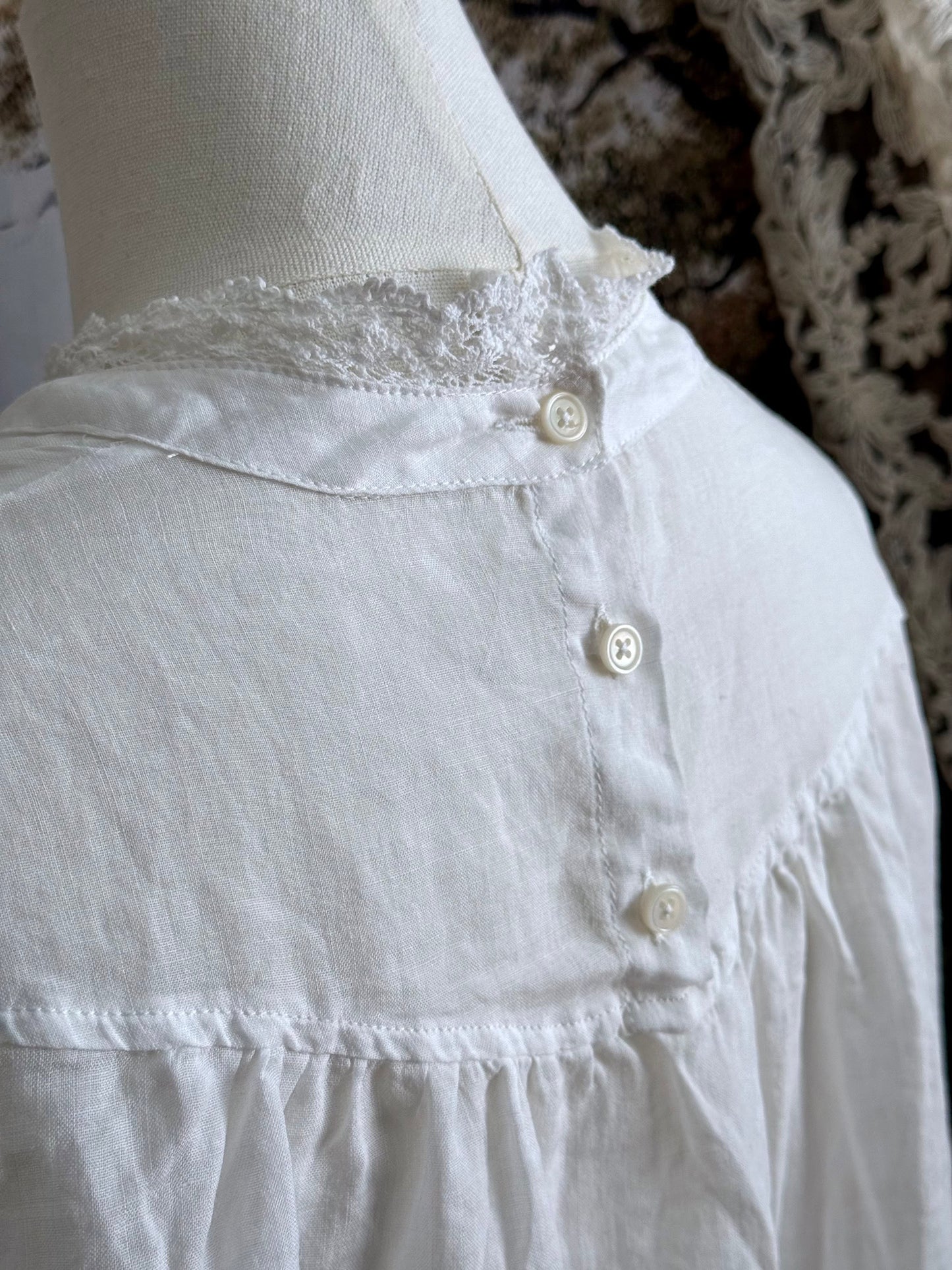 Button details on the neck