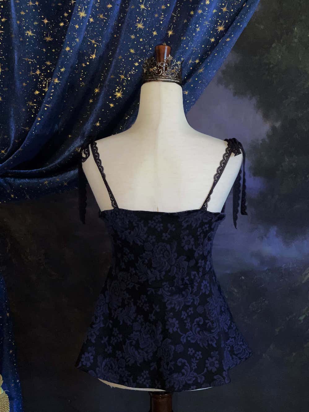 An Upcycled Ornate Damask Fabric Structured Peplum Top with Lace Trim in Black and Navy Blue.