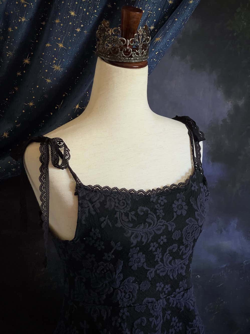 An Upcycled Ornate Damask Fabric Structured Peplum Top with Lace Trim in Black and Navy Blue.