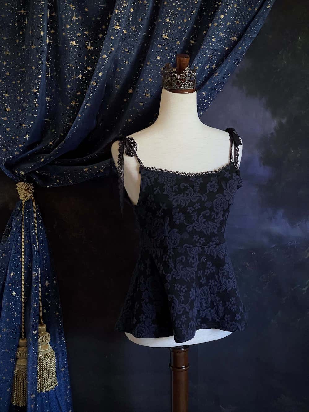 An Upcycled Ornate Damask Fabric Structured Peplum Top with Lace Trim in Black and Navy Blue.