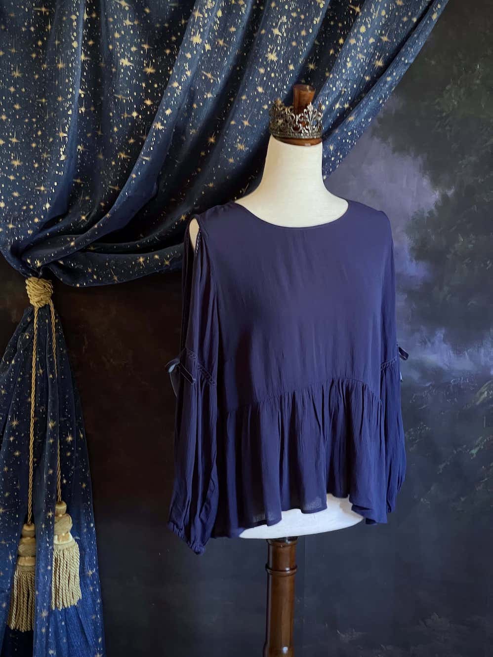 A Flowy Cold-Shoulder Historically Inspired Peasant Blouse with Velvet Ribbons in Navy Blue