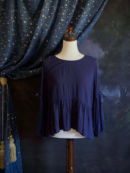 A Flowy Cold-Shoulder Historically Inspired Peasant Blouse with Velvet Ribbons in Navy Blue