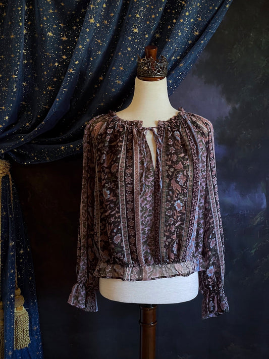 A Historically Inspired Botanical Print Peasant Blouse with Gathered Waist and Bell Tulip Bishop Sleeves in Black, Purple, Blue.