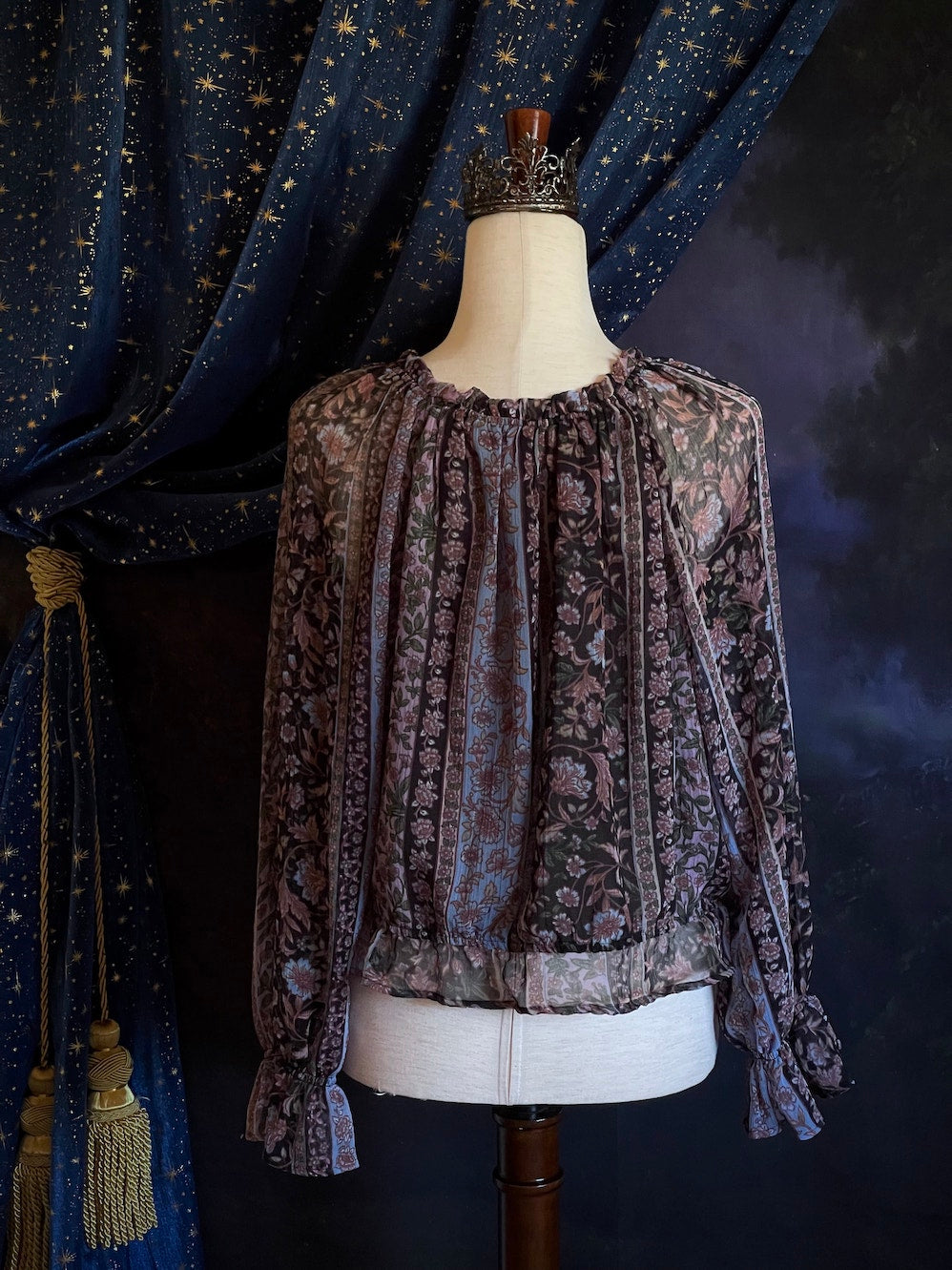 A Historically Inspired Botanical Print Peasant Blouse with Gathered Waist and Bell Tulip Bishop Sleeves in Black, Purple, Blue.