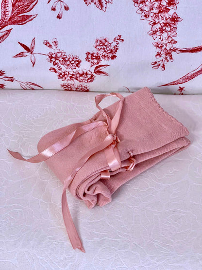 A pair of historically inspired knee high stocking socks in ballerina pink, for edwardian, victorian, regency, rococo, baroque, renaissance, and medieval era fashion.