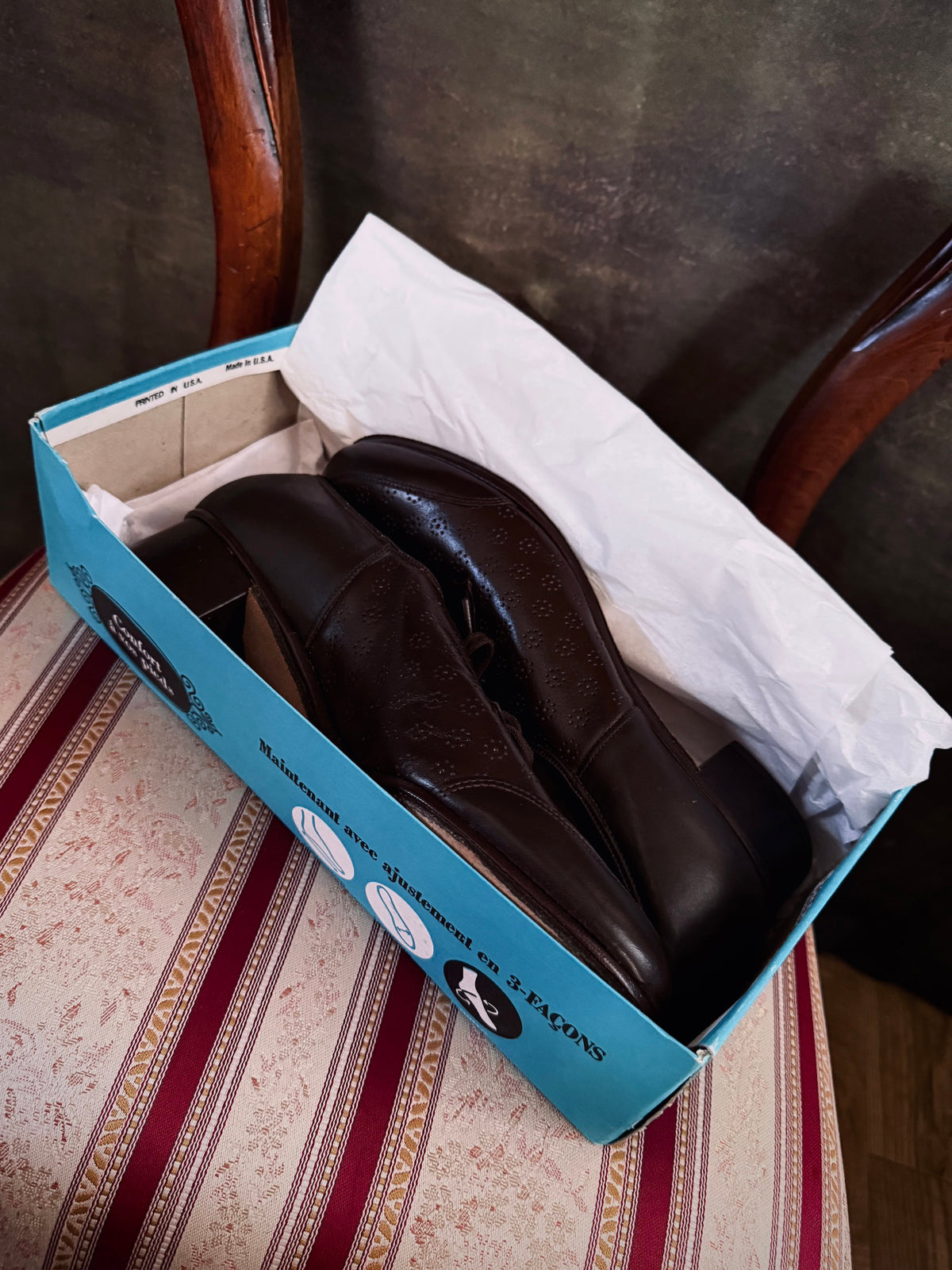 Shoes inside original box.